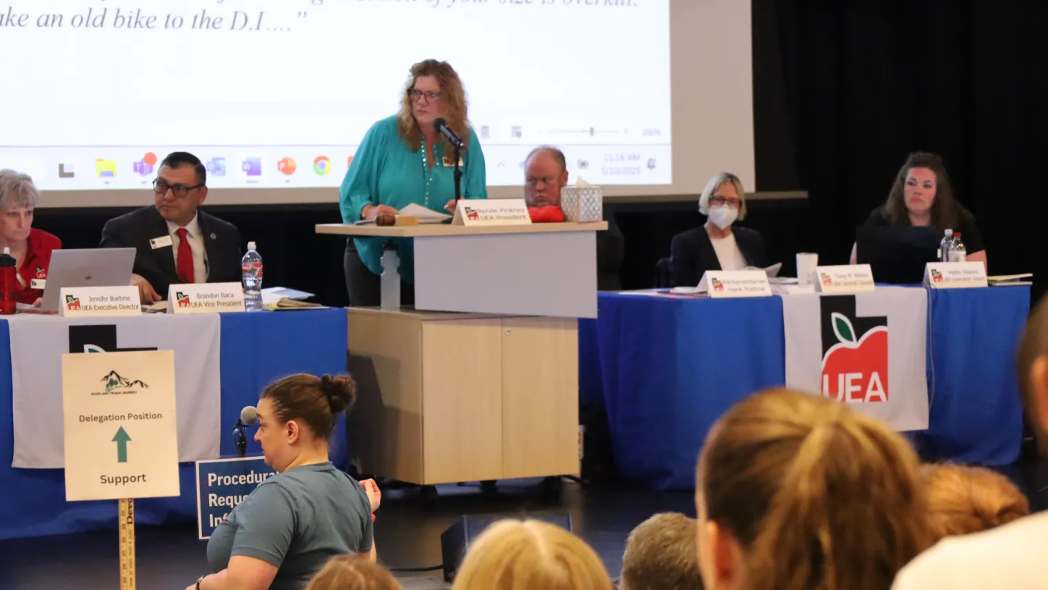 President Pinkney standing at podium