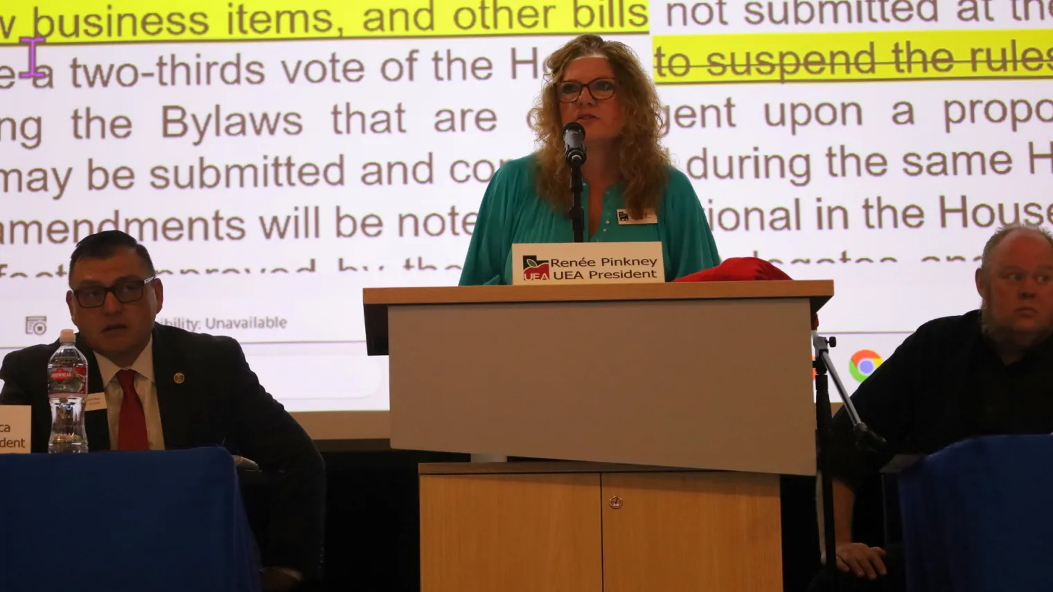 President Pinkney speaks at a podium.