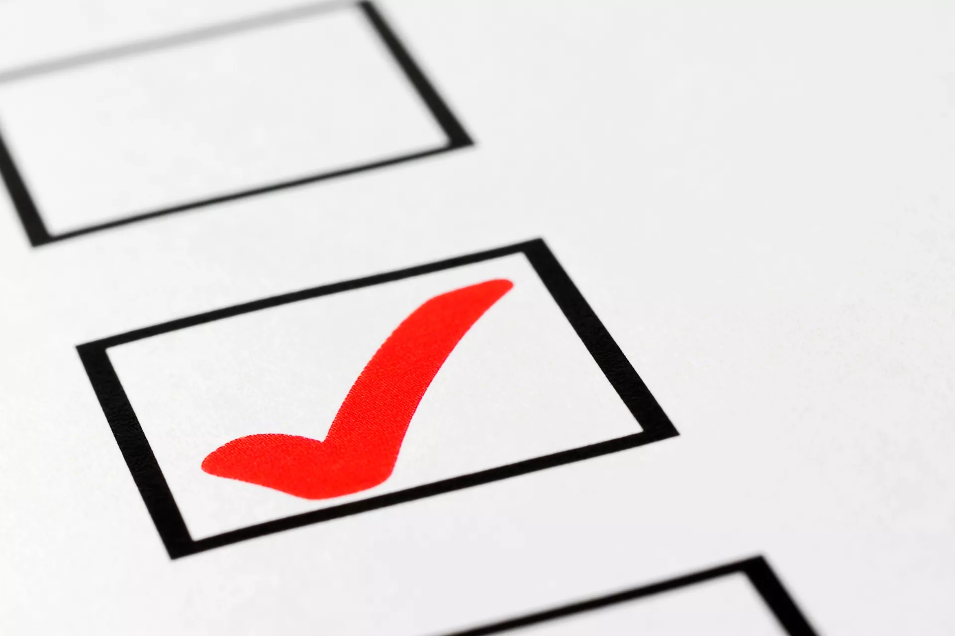 Square box with a red checkmark.