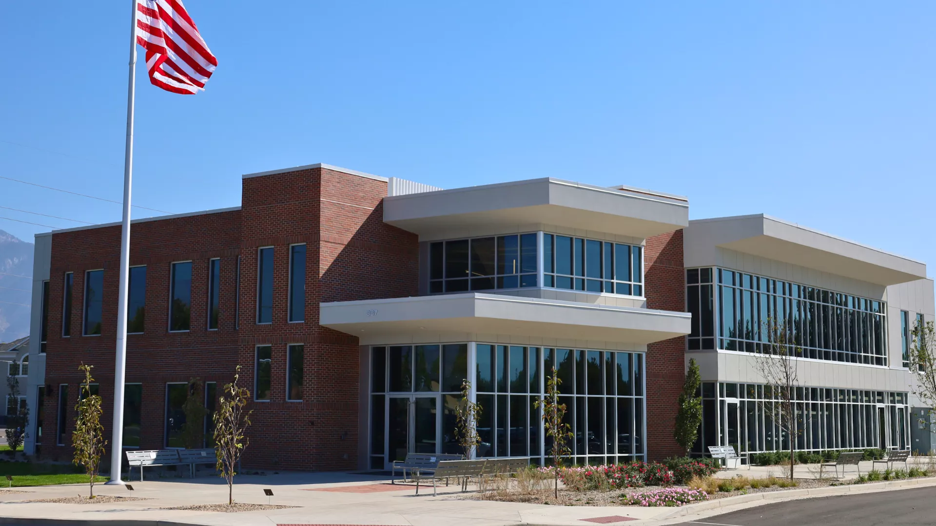 New UEA building with flag in the foreground.