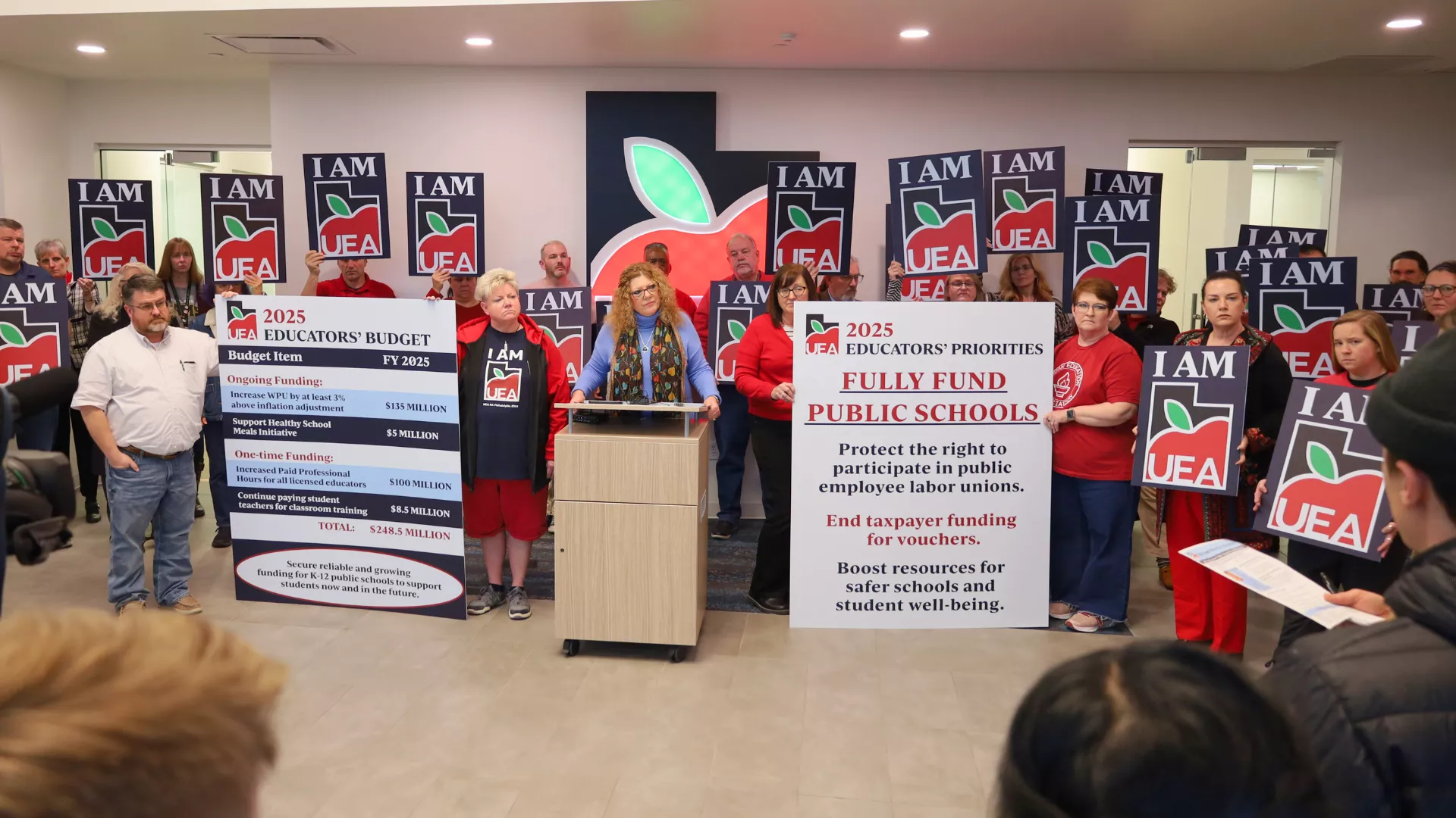 Wide shot of UEA press conference. 