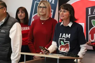 Ms. Graviet speaking at press event