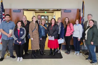 Group of people smiling.