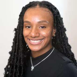 headshot of Damia Ali
