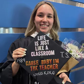 Esther King with her graduation cap