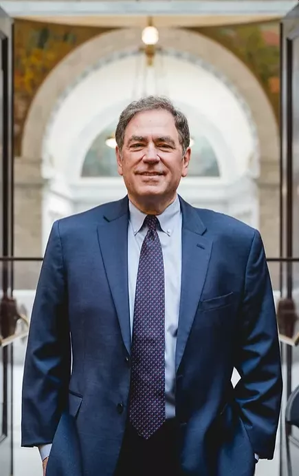 Rep. Brian King stands at Utah Capitol with blue suit.