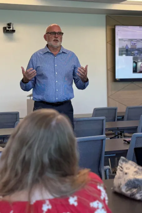 Glenn Baffia speaks to UEA staff. 