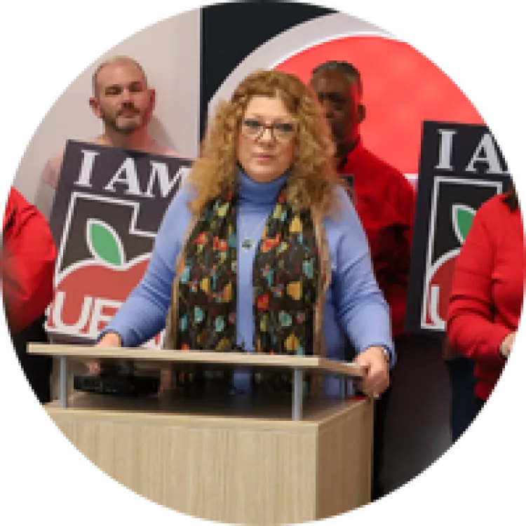 Renee Pinkney at a podium. 