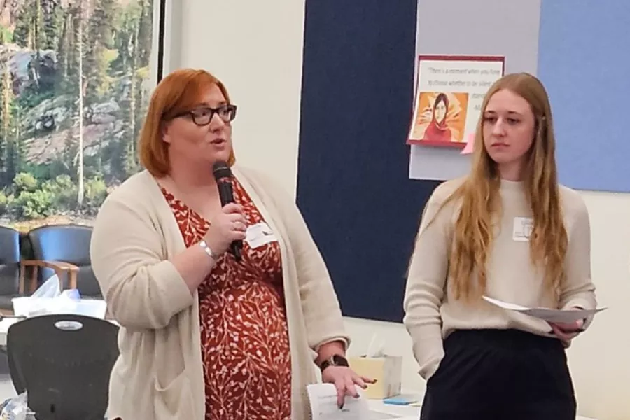 A teacher with a microphone